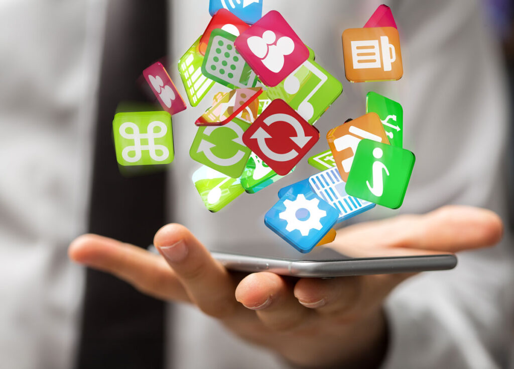 Apps und Agents für Studium und Beruf - Symbolbild: Hand jogliert Apps Symbole